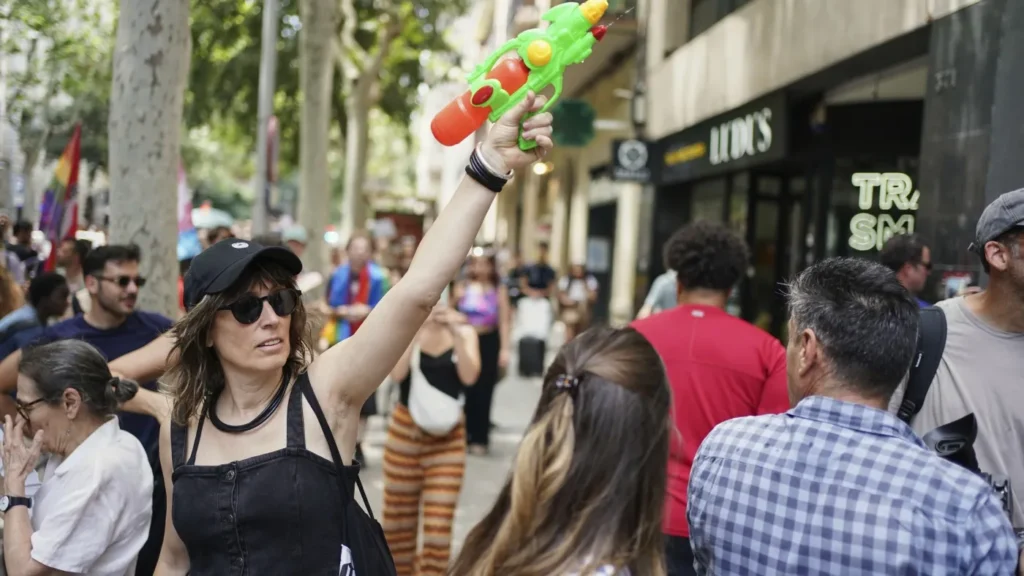 Spaniards flip aqua pistols on guests to protest tourism : NPR